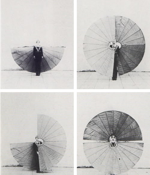 3:04 PMClaude responded: Vintage black and white art photography of figure with large circular sculptural wings - creative inspiration Rhizo HomeVintage black and white art photography of figure with large circular sculptural wings - creative inspiration Rhizo Home